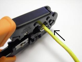 Insert mod plug into crimp tool and squeeze handle
